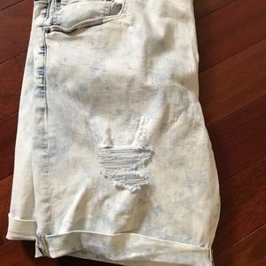 Acid washed, distressed jeans shorts. W42
